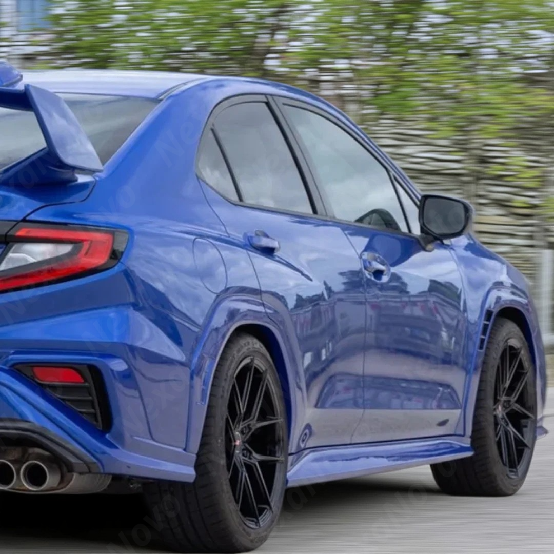 Close-up of a Nexanovo K7X WR Blue Pearl fender flare on a Subaru VB WRX