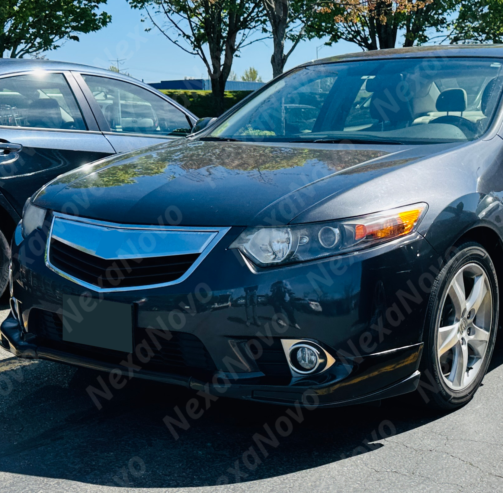 Close-up of the front splitter spoiler body kit design on the TSX bumper