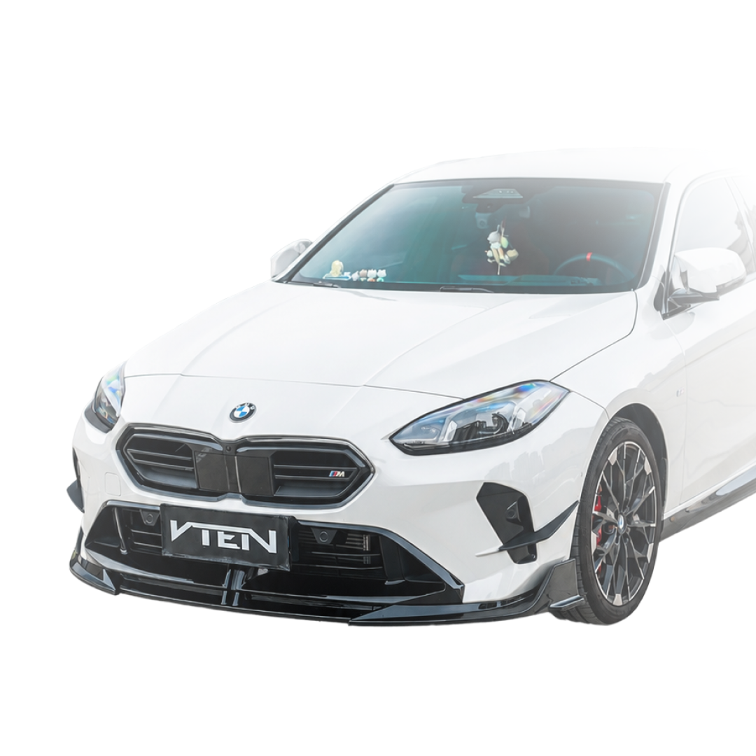Direct front-facing view highlighting the low-slung, planted stance of the VTEN front lip on the F74 chassis