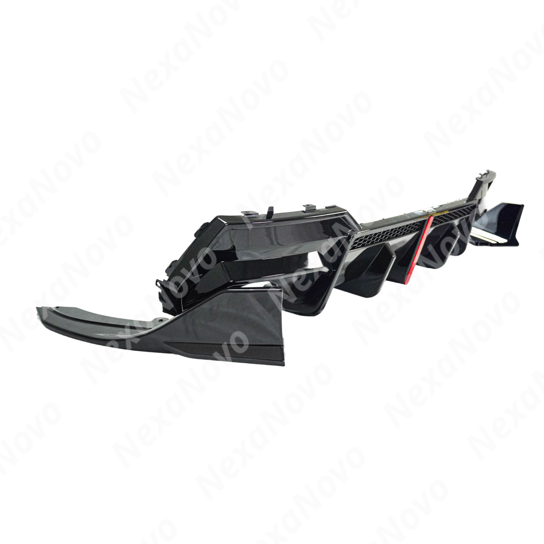 Close-up of exhaust cutouts on rear diffuser