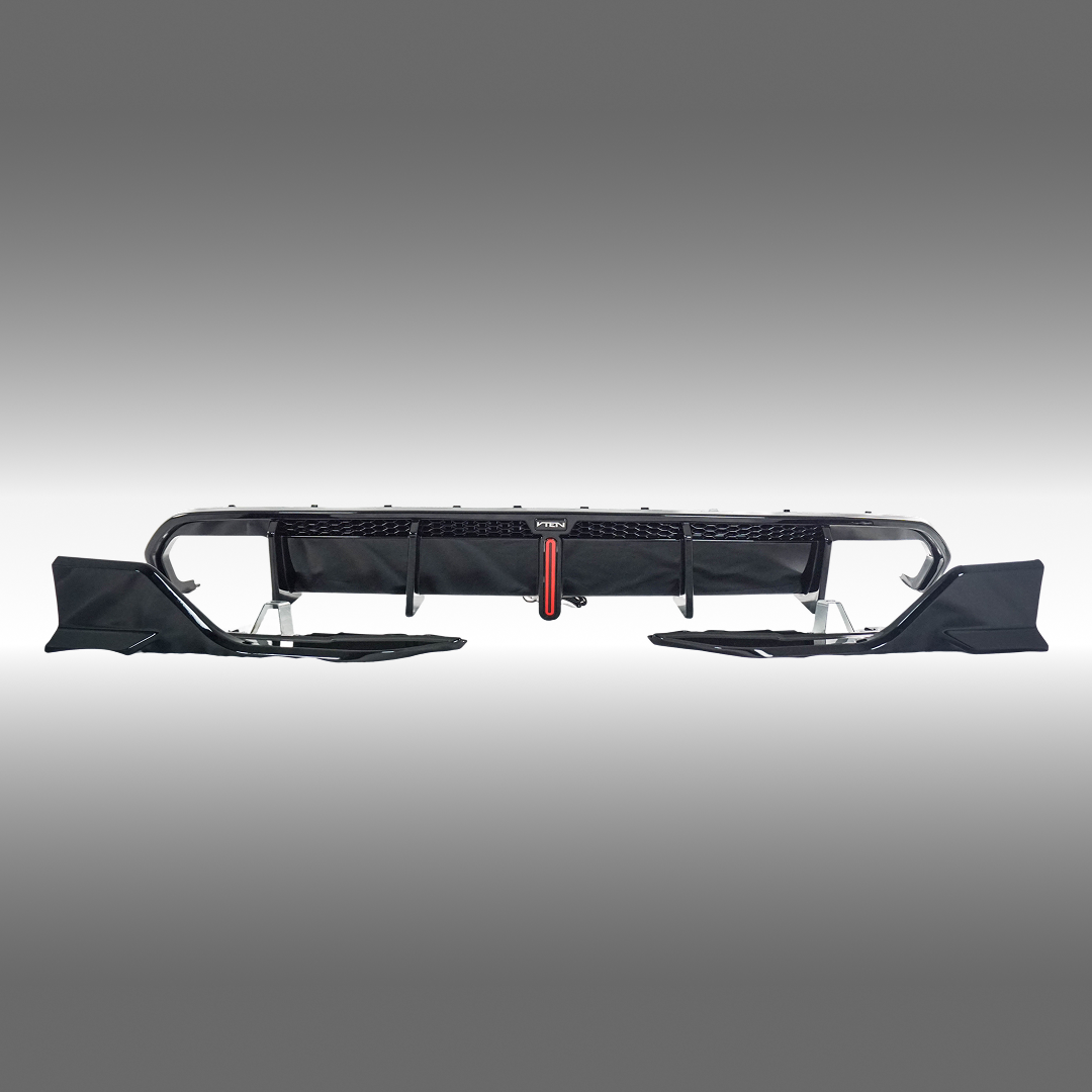 BMW G26 4 Series in motion with illuminated VTEN dual exhaust rear diffuser kit