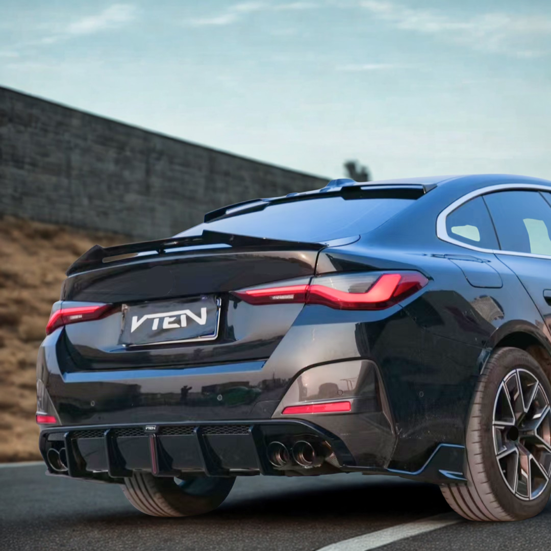 Low angle view emphasizing VTEN dual exhaust rear diffuser, LED, and splitters on G26