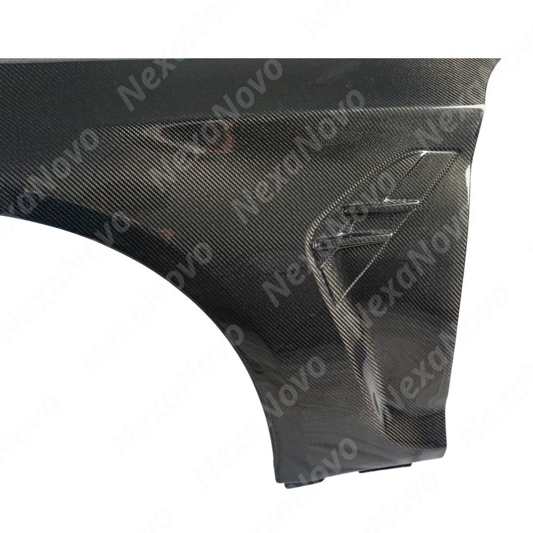 NexaNovo M style real carbon fiber front side vented fender panel on a white BMW G30