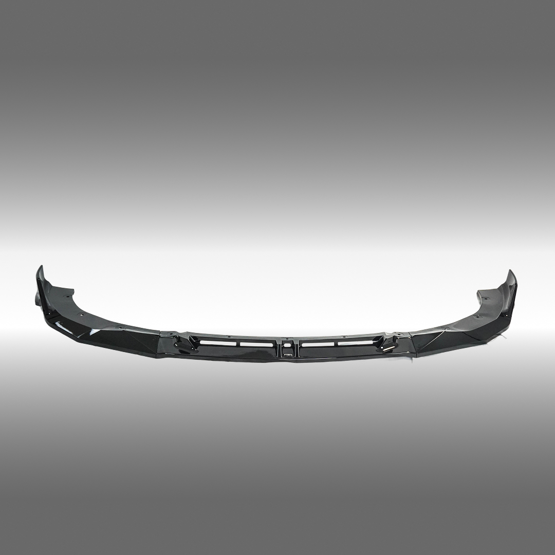 Detailed view of the VTEN front lip's contours on a G42