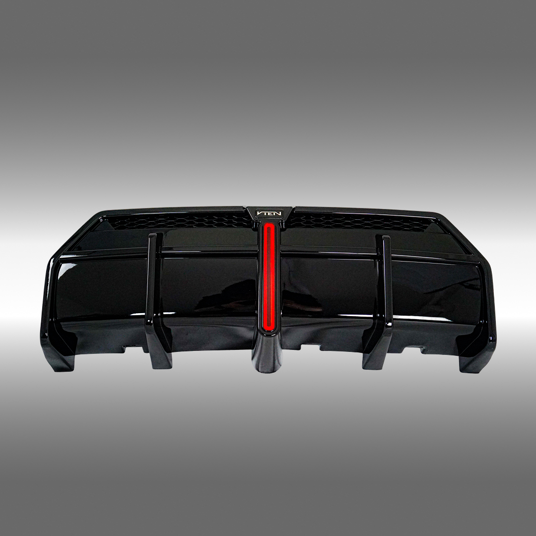 Close-up of the glossy black texture of VTEN rear diffuser on G42