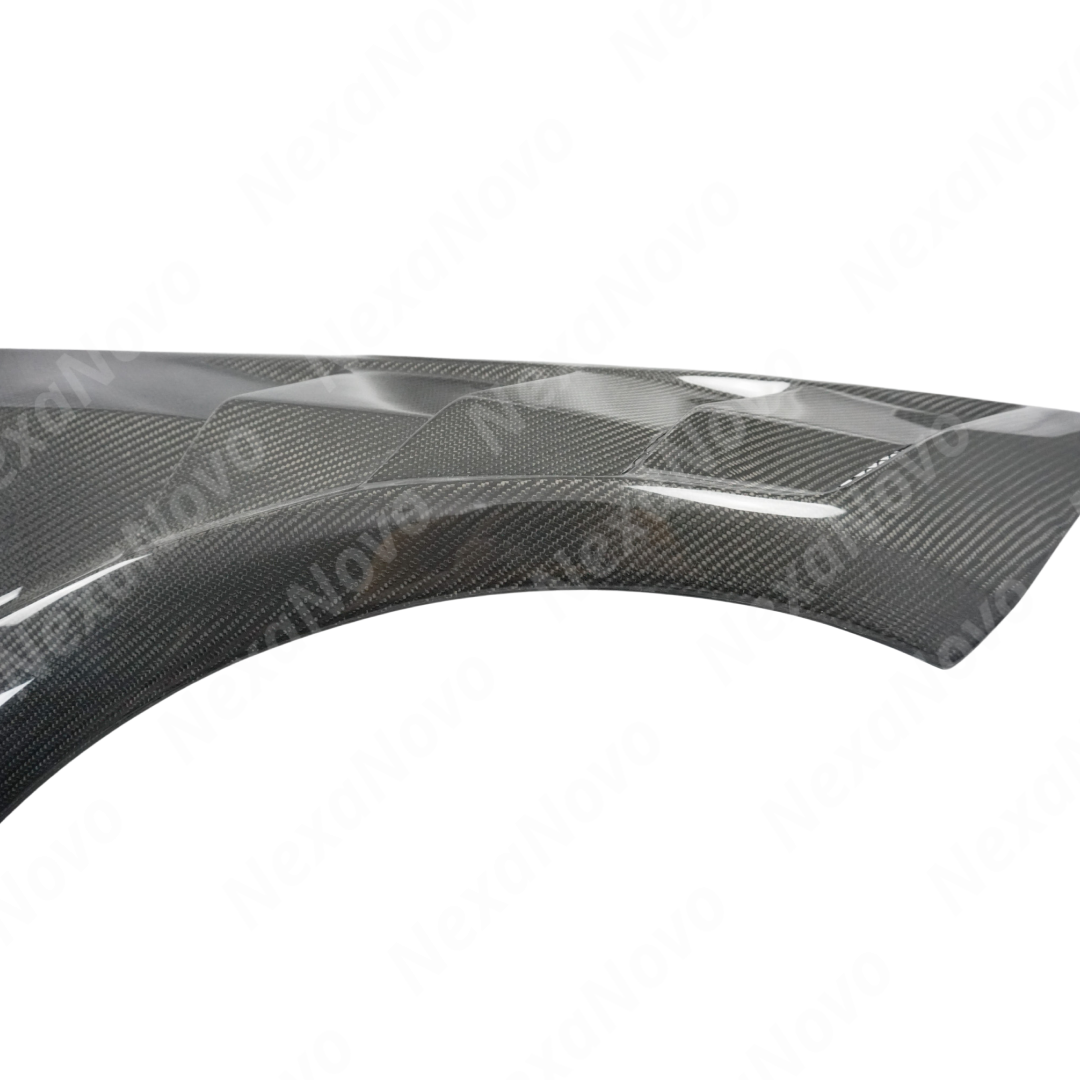 Rear view of uninstalled NexaNovo carbon fiber fender panel showing mounting points