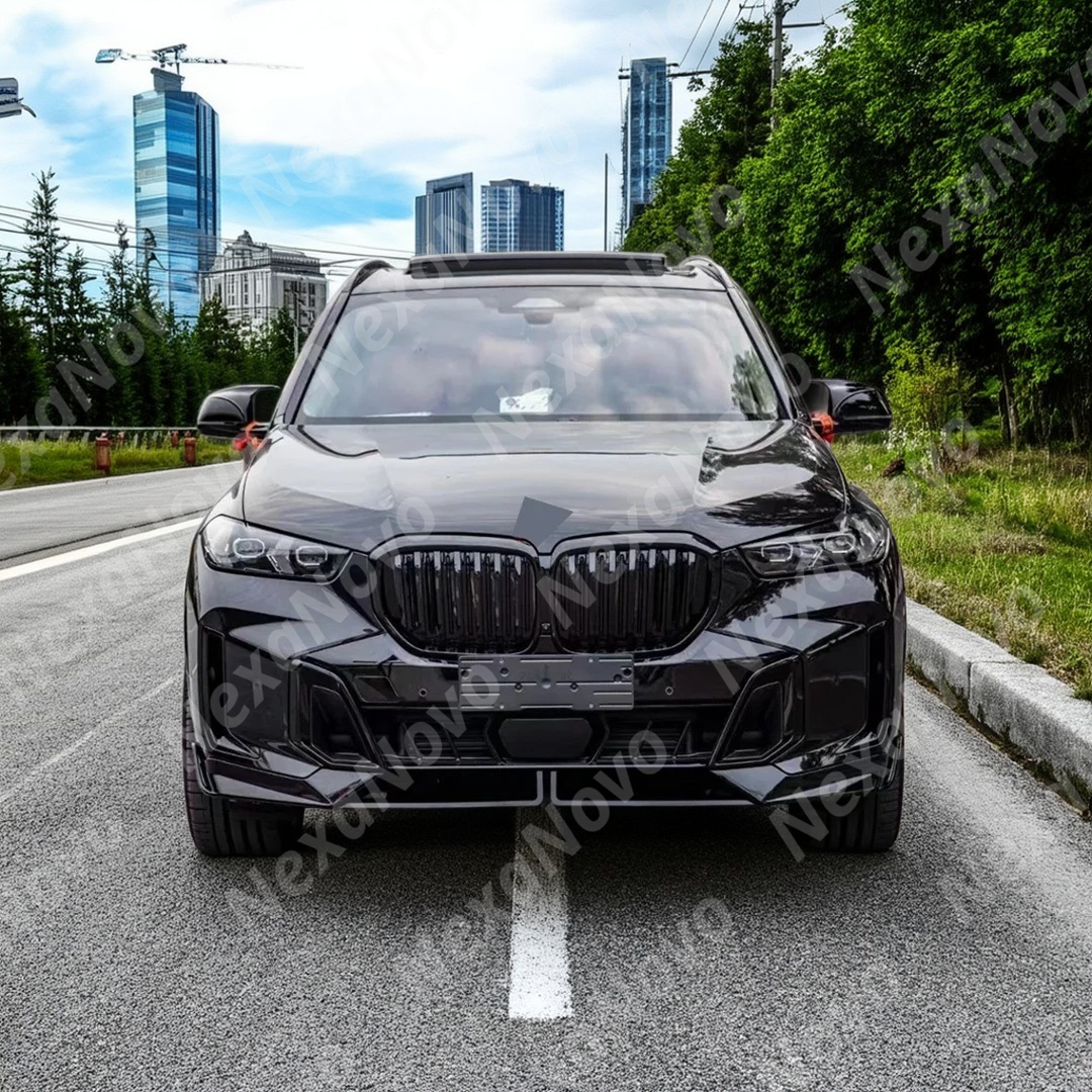Studio shot highlighting glossy black front ornamental grille on BMW X5