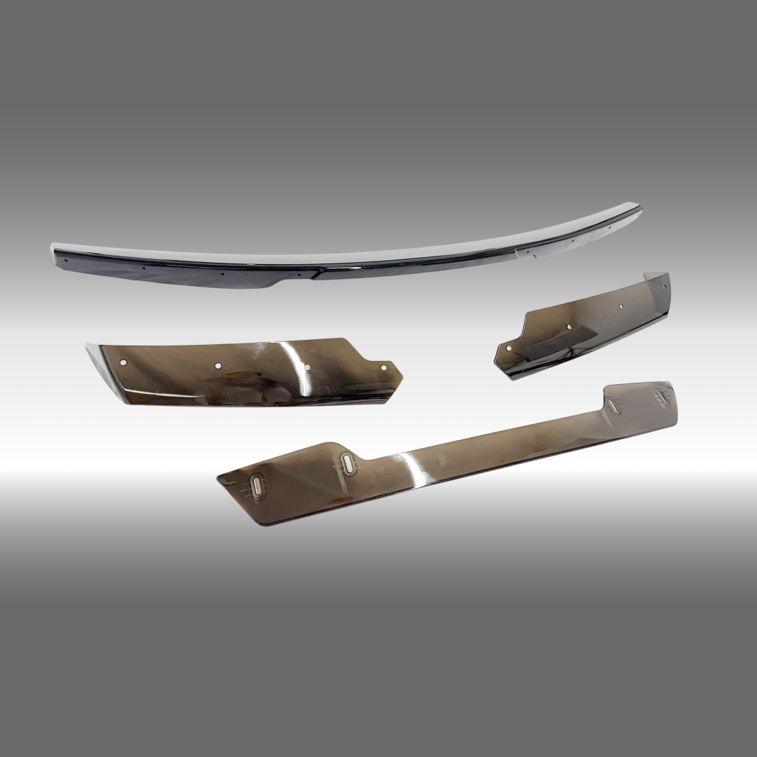 NexaNovo gloss black rear trunk lip spoiler wing with gurney flap on a 2014 C7 Corvette