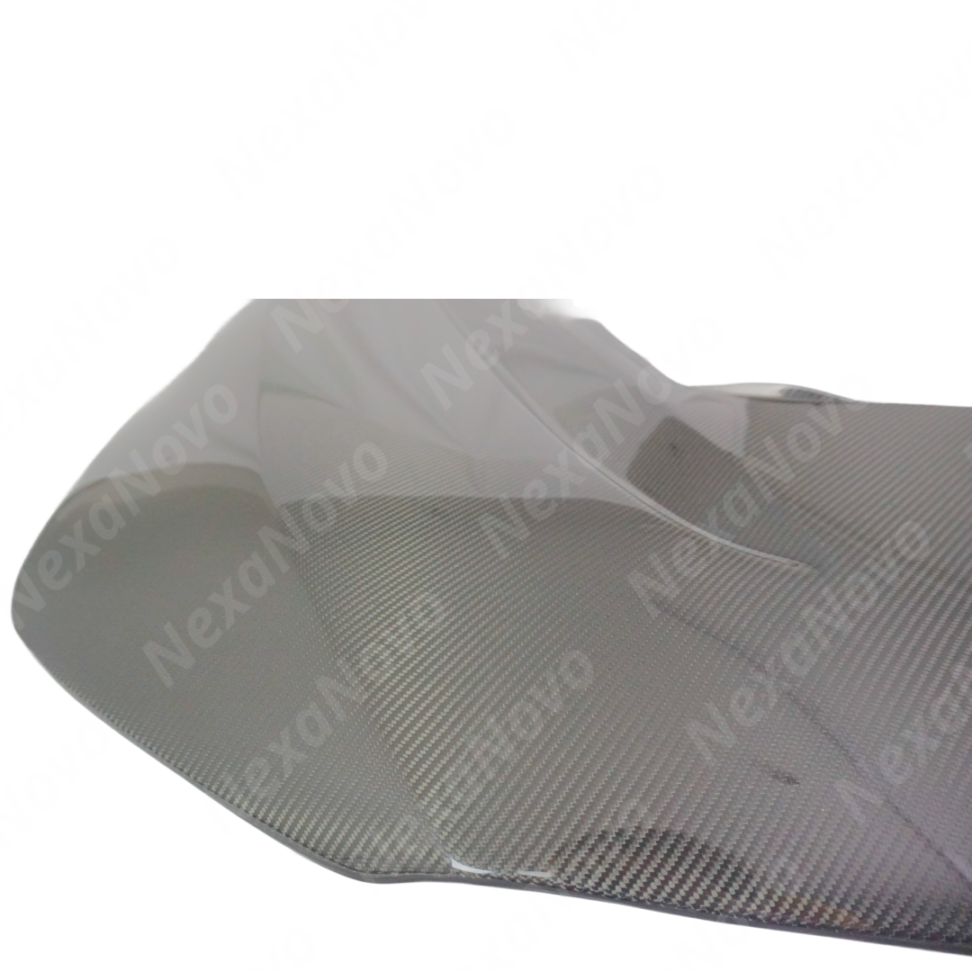 Sleek NexaNovo carbon fiber hood cover installed on a Cadillac CT4-V