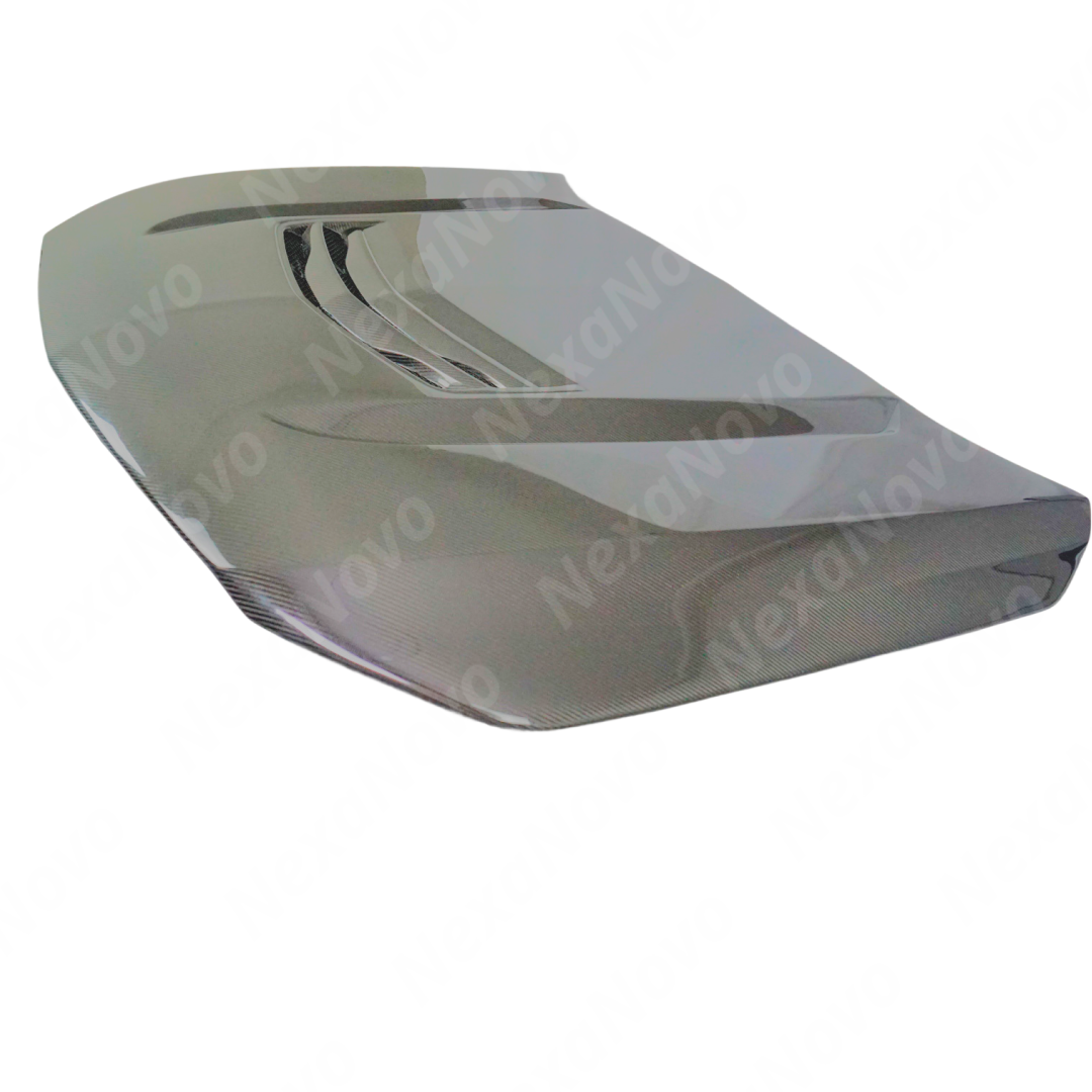 Uninstalled NexaNovo real carbon fiber V style vented engine hood cover, top view