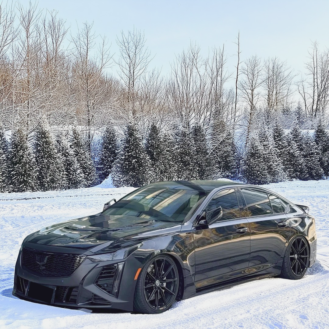 Sleek NexaNovo carbon fiber hood cover installed on a Cadillac CT5-V