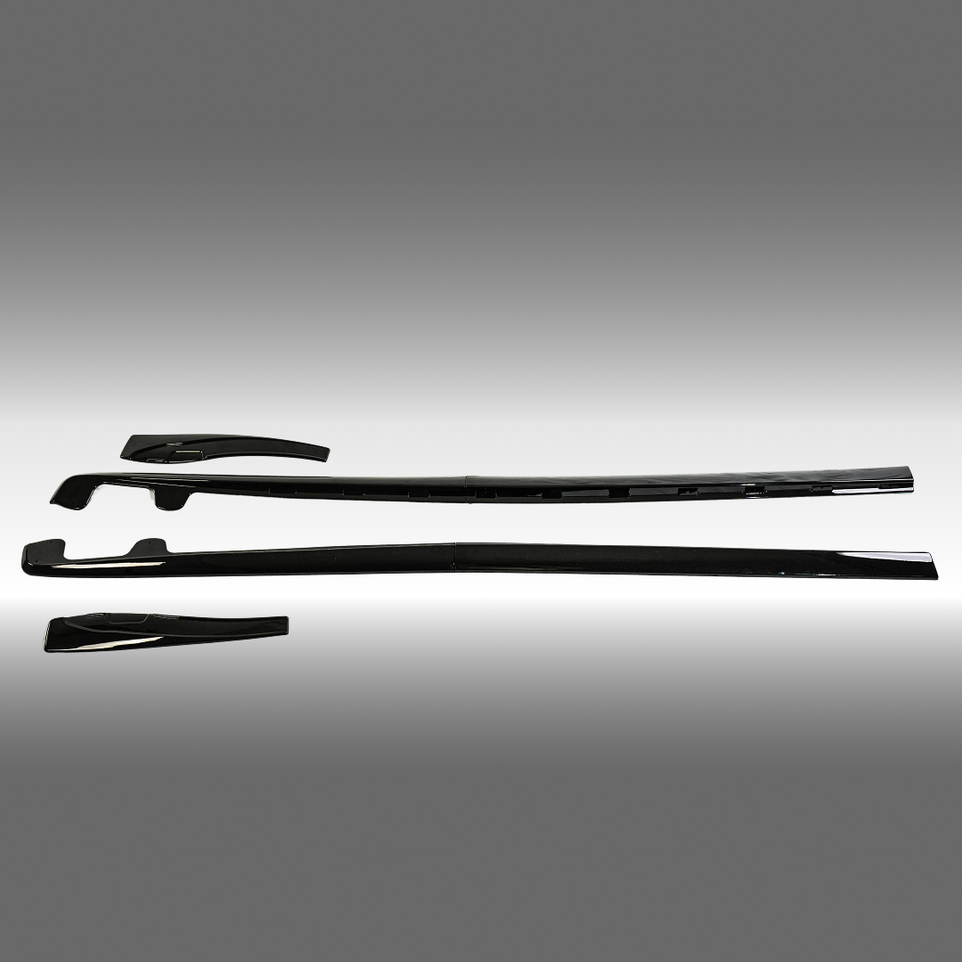 NexaNovo ZR1 style gloss black side skirt rocker panel and mud flaps installed on a 2005 Chevrolet Corvette C6