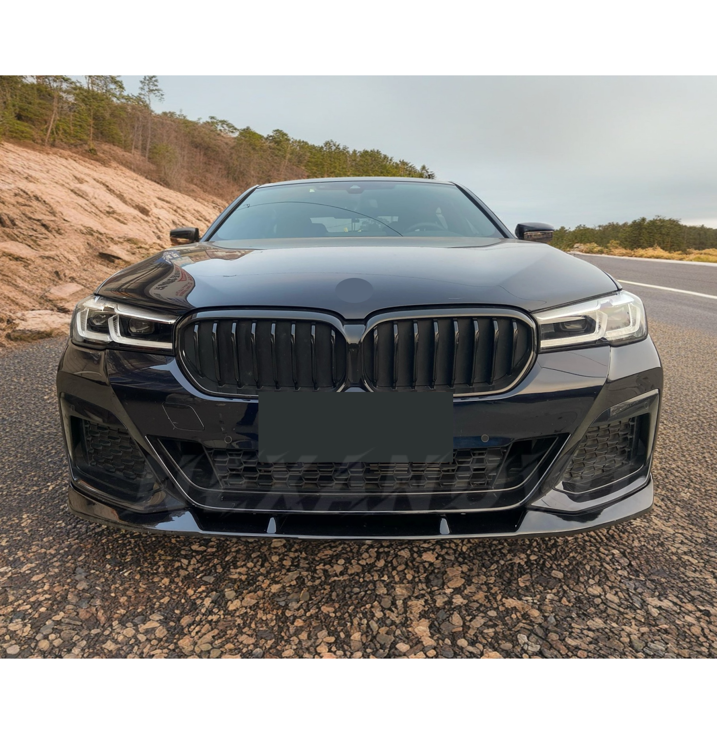 BMW 5 Series G30 LCI equipped with NexaNovo Gloss Black Front Splitter, enhancing the front end with a lip spoiler for a distinct and stylish look