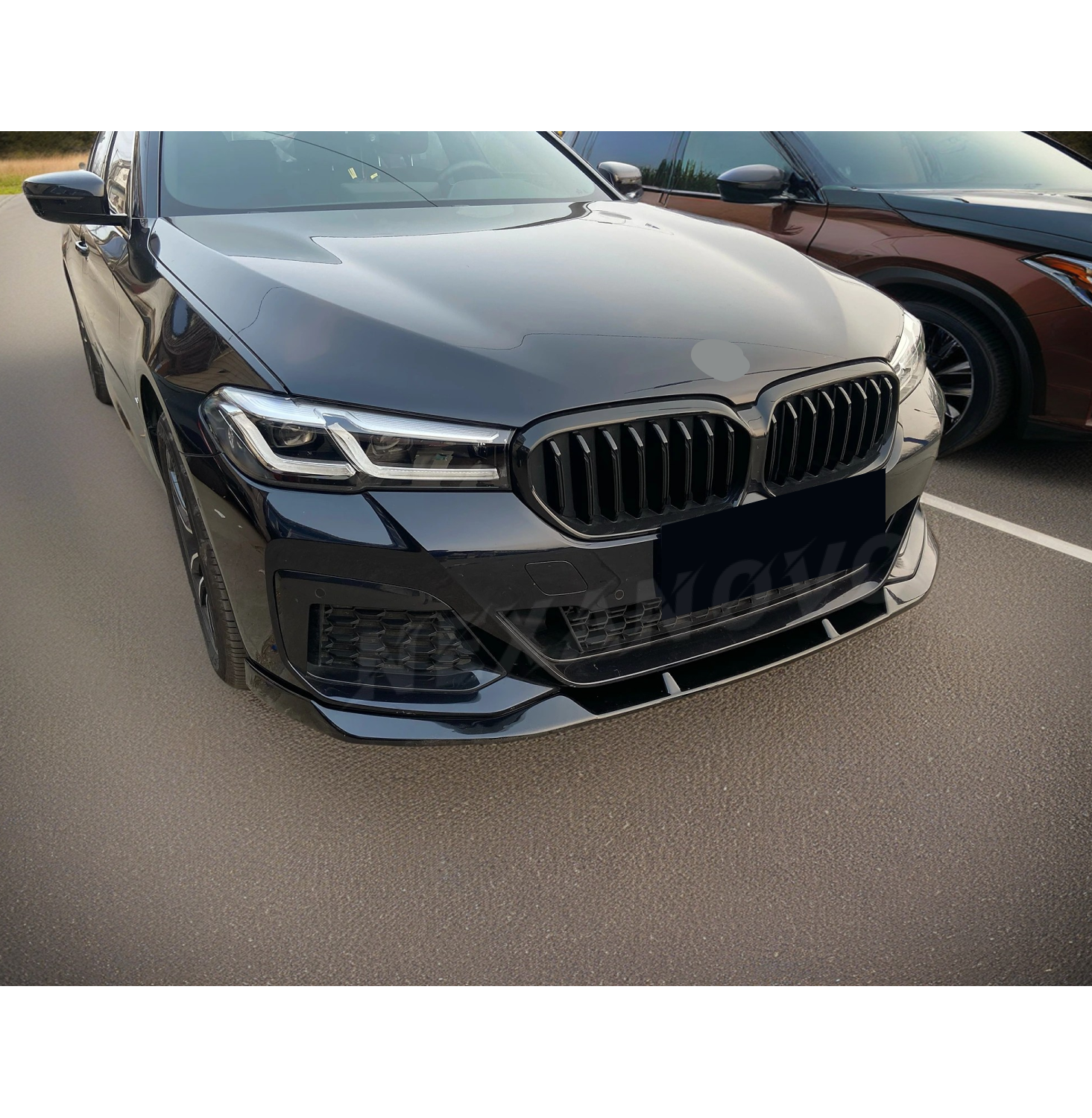 BMW 5 Series G30 LCI equipped with NexaNovo's Gloss Black Front Splitter, enhancing the front end with a lip front for a distinct and stylish appearance.