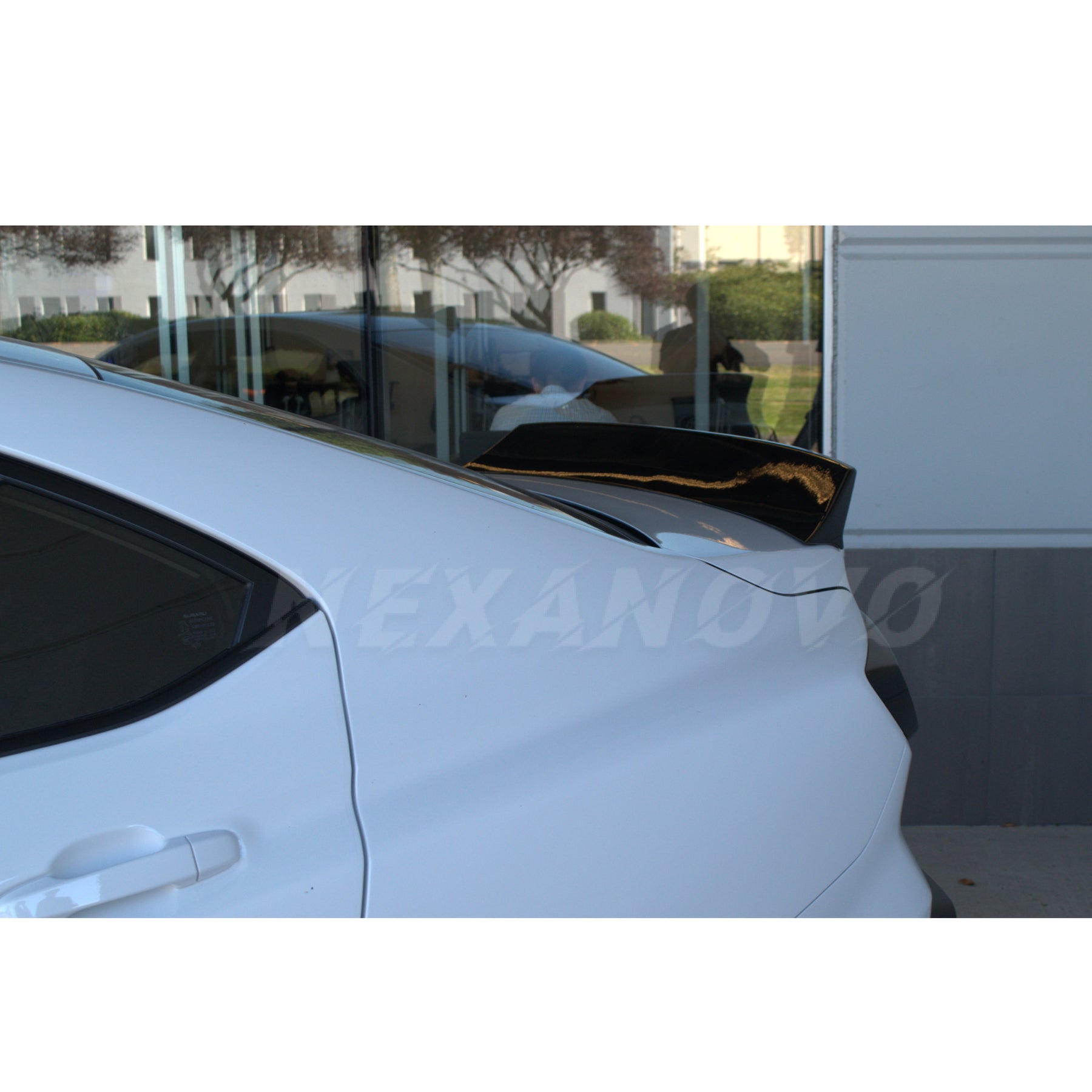 Profile shot capturing the sleek lines and high-quality finish of the Duckbill Trunk Spoiler on the WRX STI 2022-2024