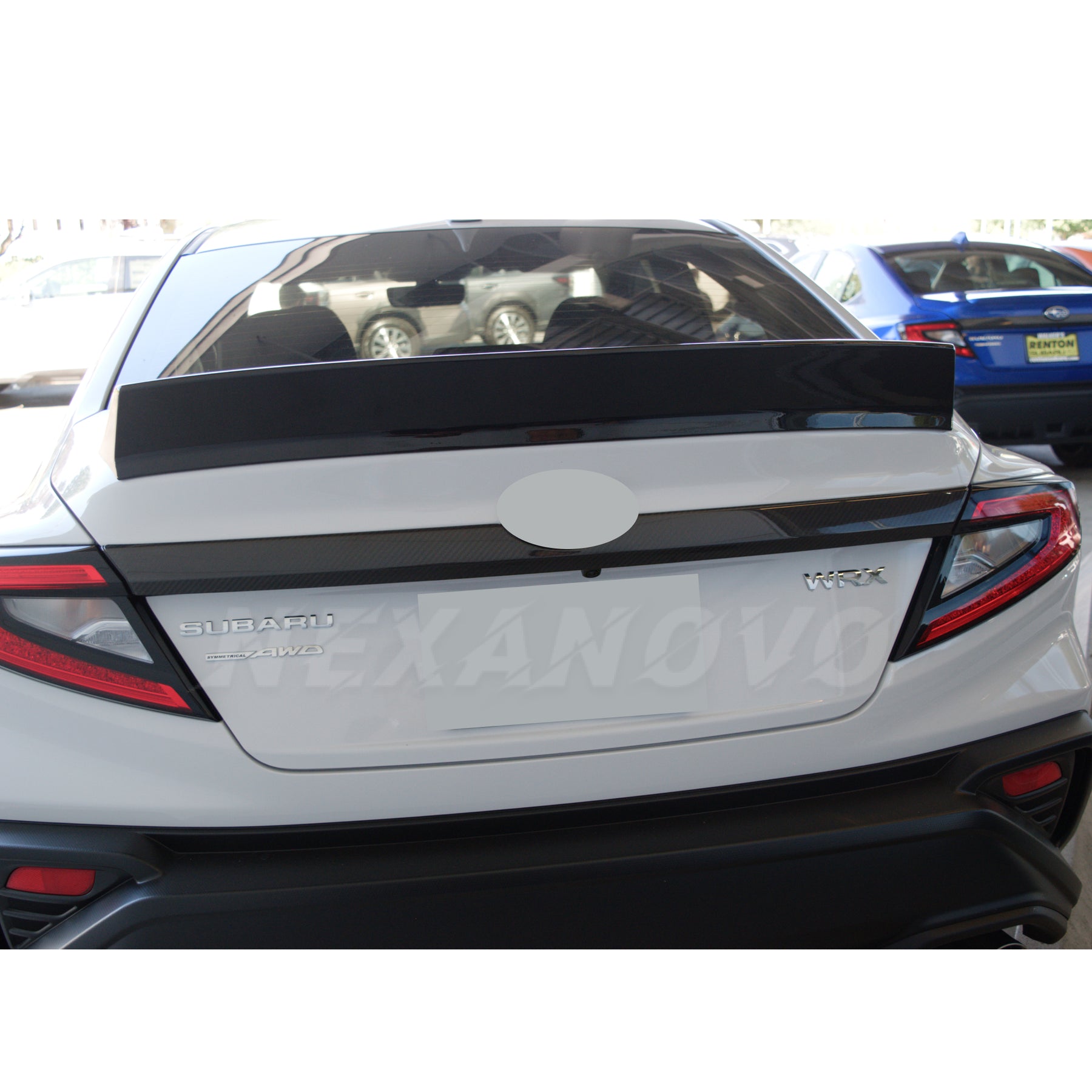 Front quarter view of the WRX STI 2022-2024 with its Ducktail Wing Spoiler in Ignition Red, highlighting the aerodynamic enhancements and sporty flair.