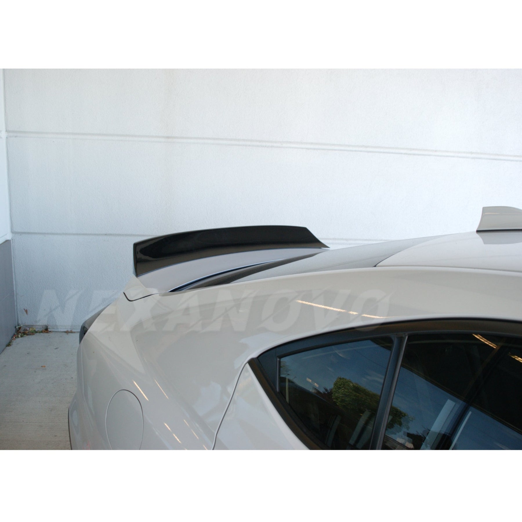 Aerodynamic profile of the WRX STI 2022-2024 with its Ignition Red Duck Bill Rear Trunk Spoiler Wing, showcasing the blend of form and function.