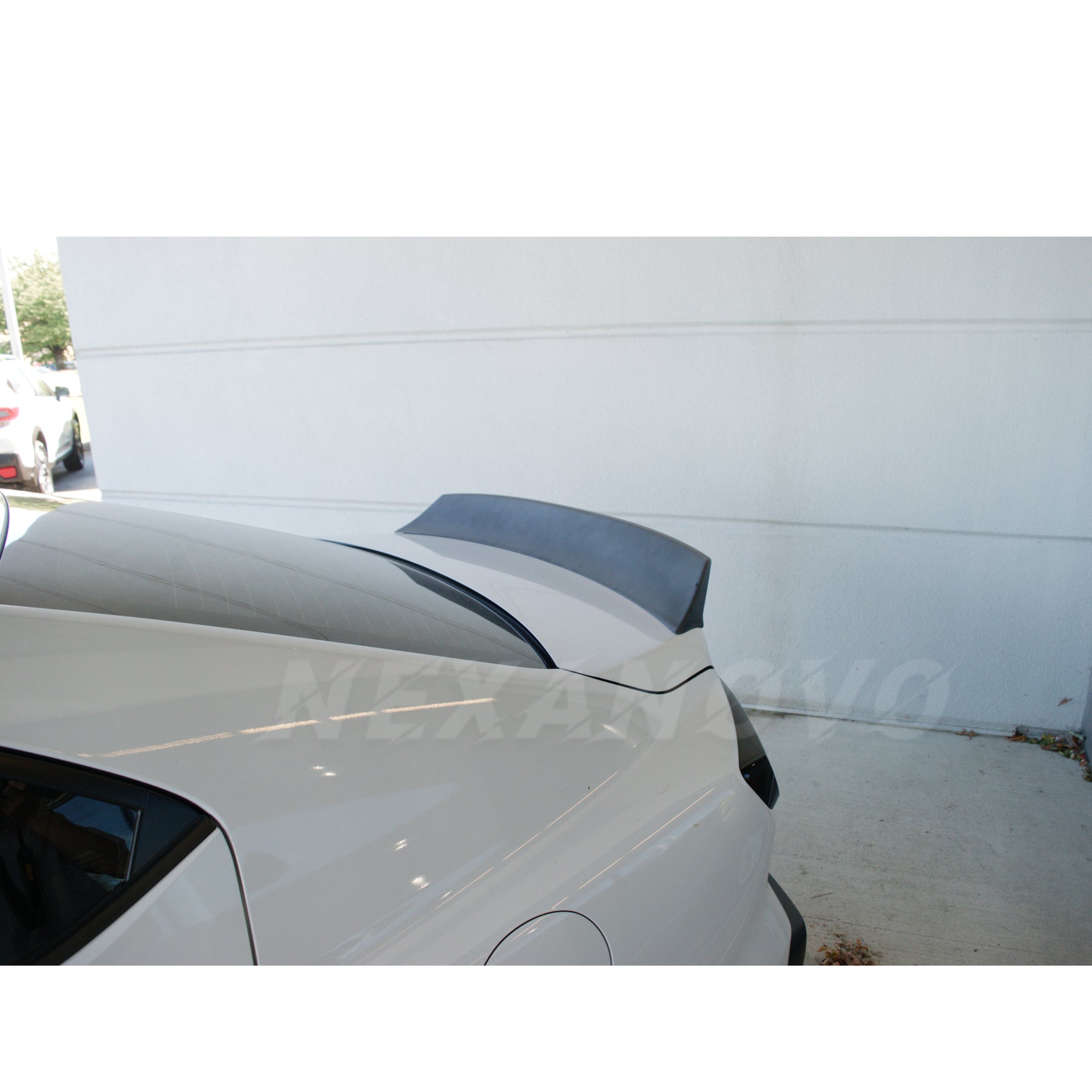 Bold and stylish look of the WRX STI 2022-2024 with its Duckbill Rear Spoiler Paint Matched in Ignition Red, accentuating the vehicle's racing heritage.