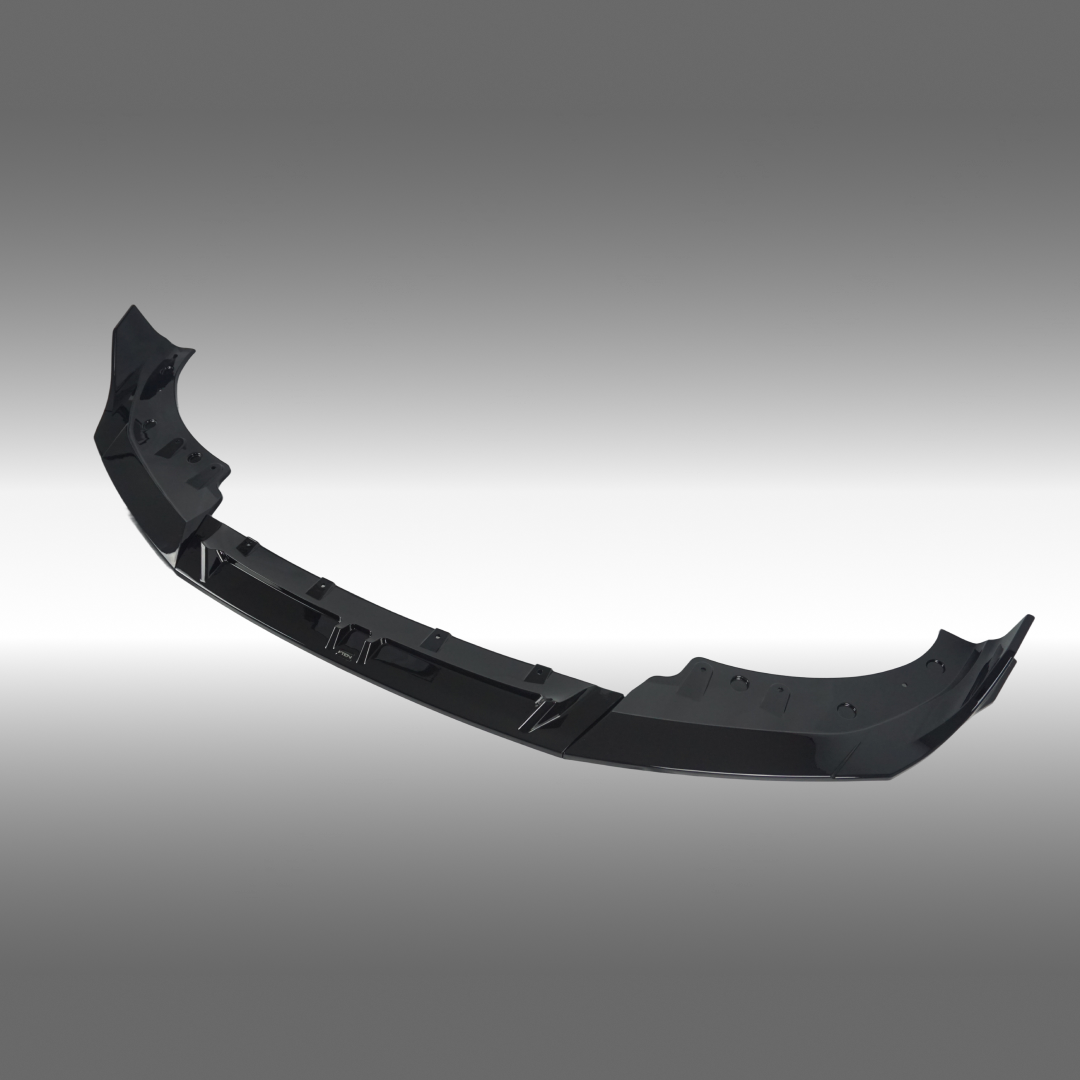 Close-up of the NaxaNovo VTEN front lip's aggressive design on a BMW 4 Series G22.