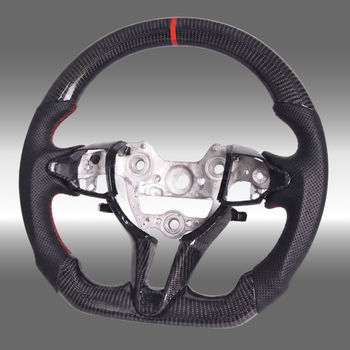 Custom 3K gloss carbon fiber sport steering wheel with perforated leather and red center stripe installed in an Elantra N cockpit