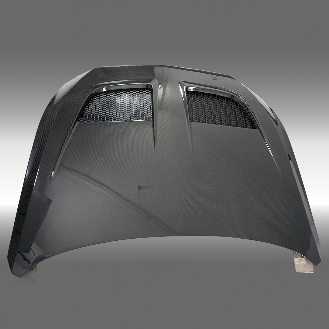 NexaNovo GTD style real carbon fiber vented engine hood cover on a 2024 Ford Mustang