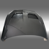 NexaNovo GTD style real carbon fiber vented engine hood cover on a 2024 Ford Mustang