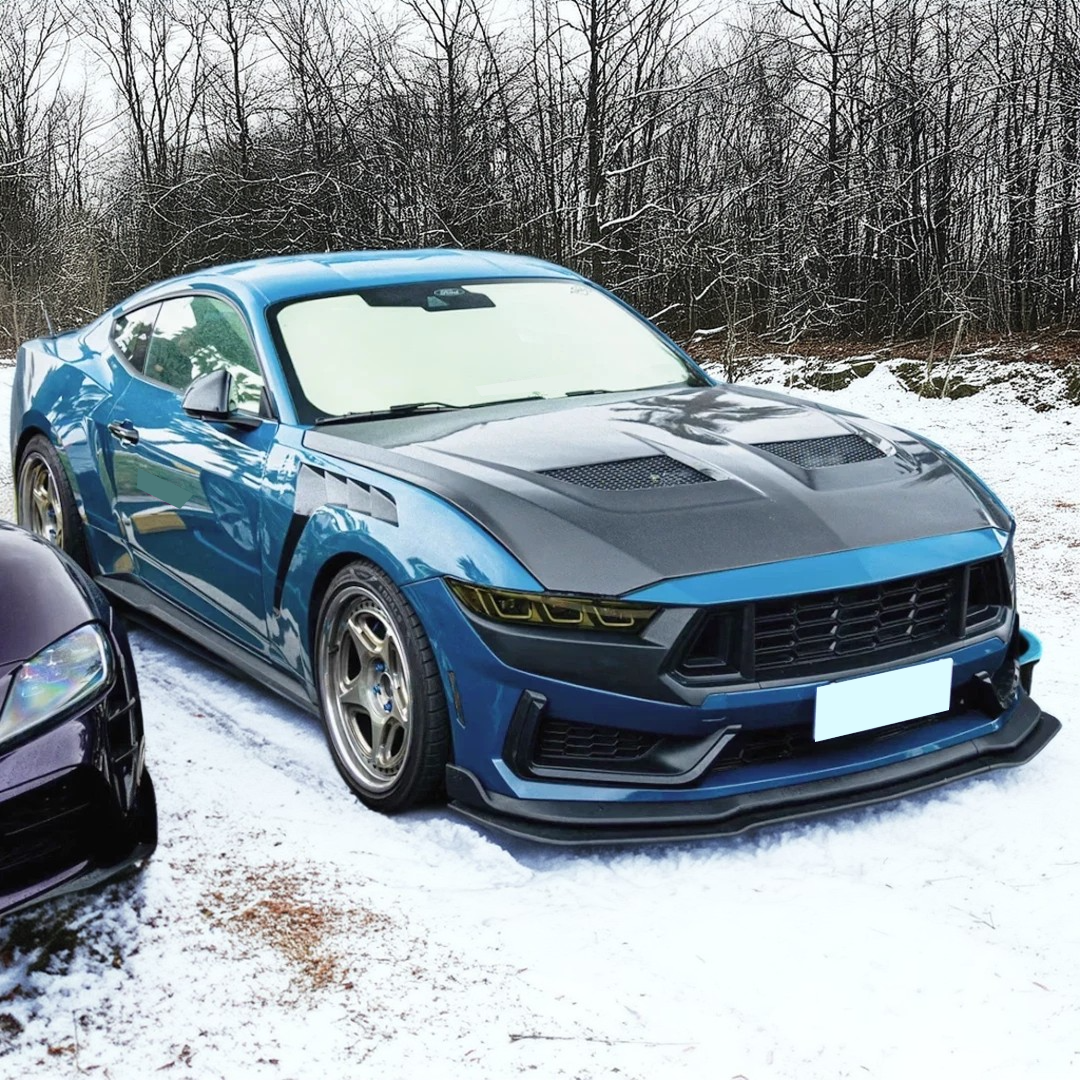 Sleek NexaNovo carbon fiber hood installed on a 2025 Ford Mustang