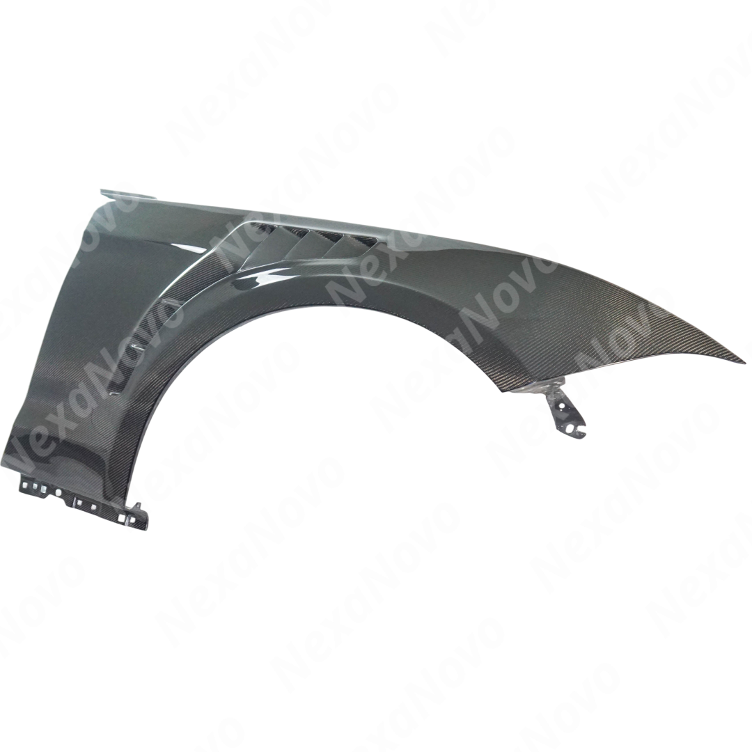 Rear view of uninstalled NexaNovo carbon fiber vent garnish showing mounting points