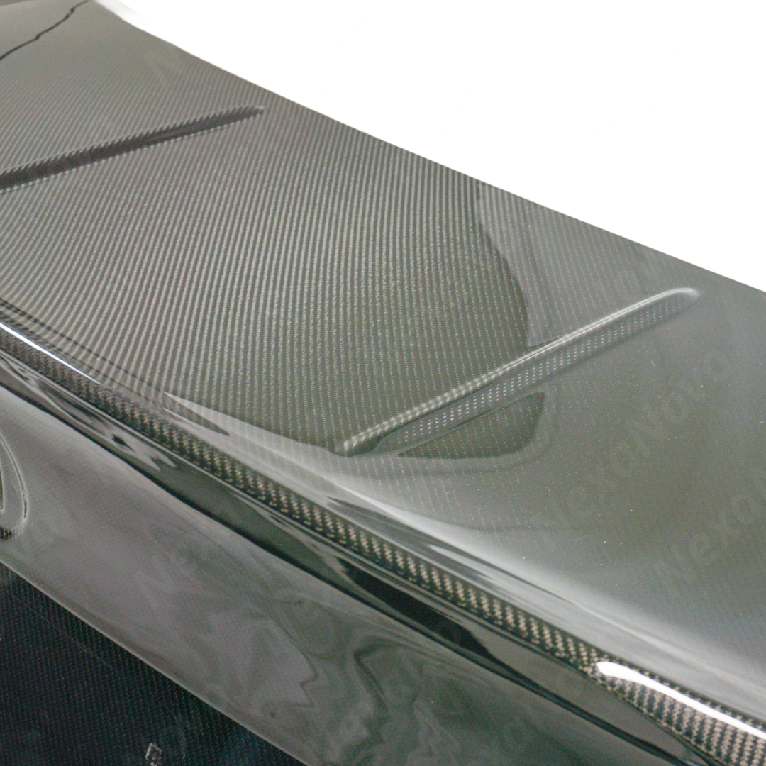 High-performance carbon fiber trunk lid for 2024 BMW G82 M4 by NexaNovo.
