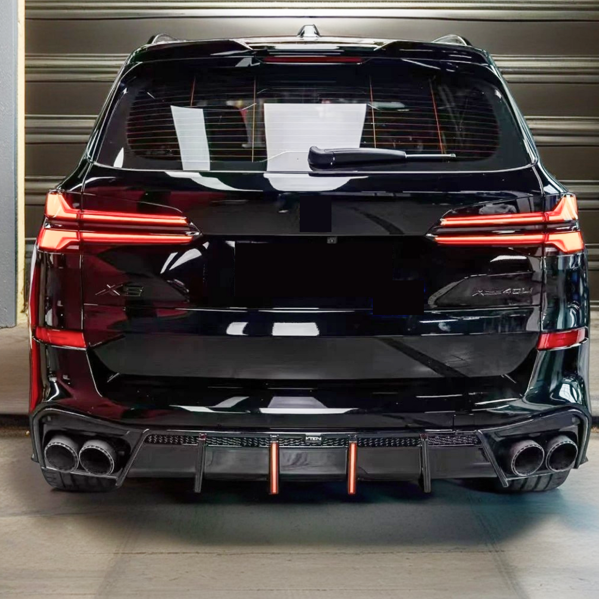 2020 BMW X5 G05 rear diffuser with LED brake light & corner splitters by NexaNovo.