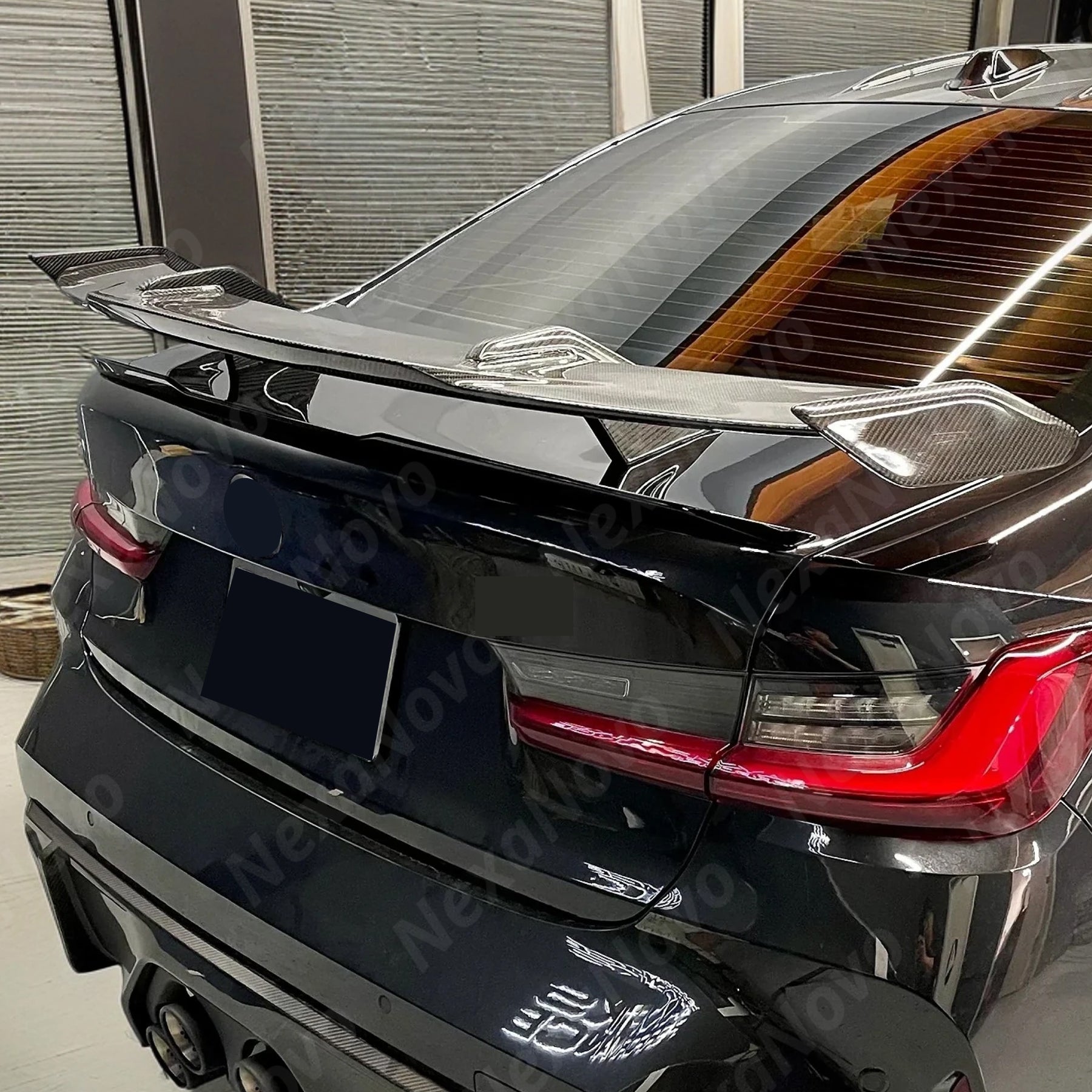 Carbon fiber rear trunk spoiler for BMW M4 2021-2025 by NexaNovo.
