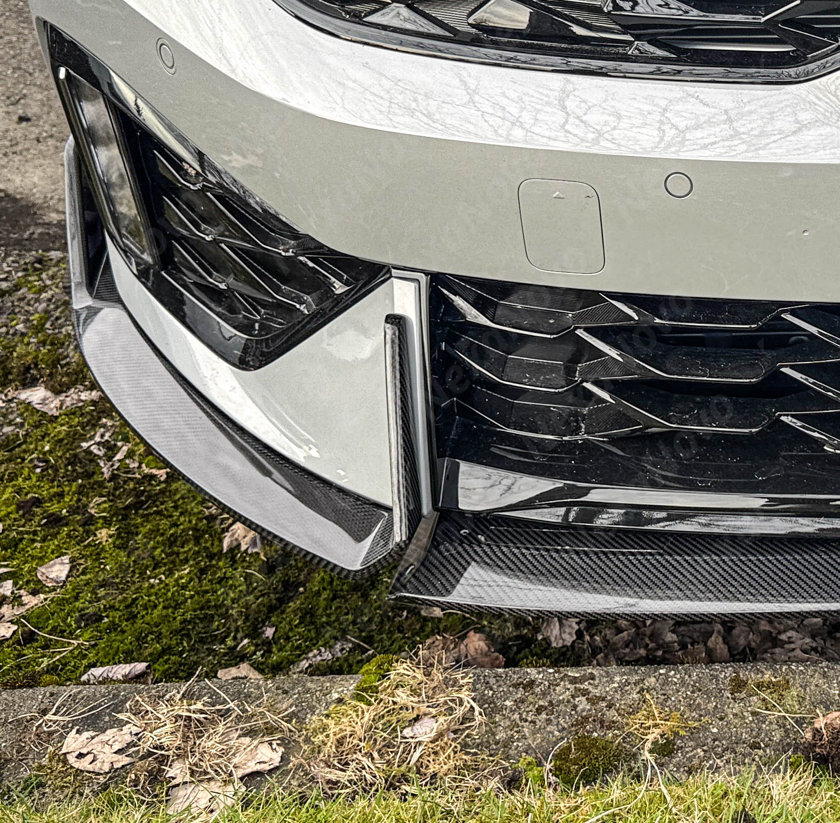 High-quality carbon fiber front lip spoiler for 2025 Kia K5 by NexaNovo.