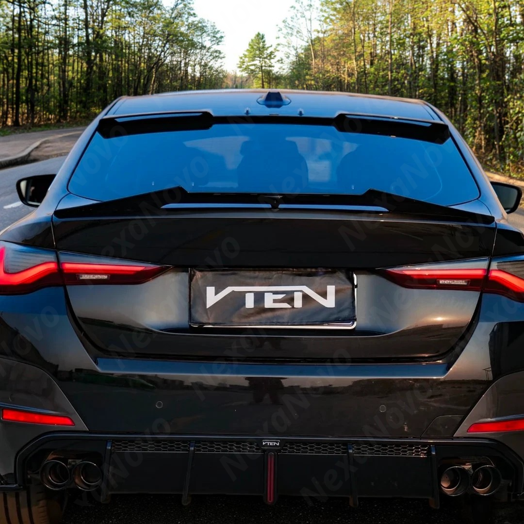 Distinctive VTEN roof spoiler accentuating the BMW G22's rear.