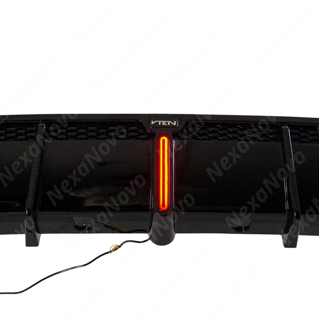 Rear diffuser bumper lip spoiler with barking light on a 2022 BMW G42