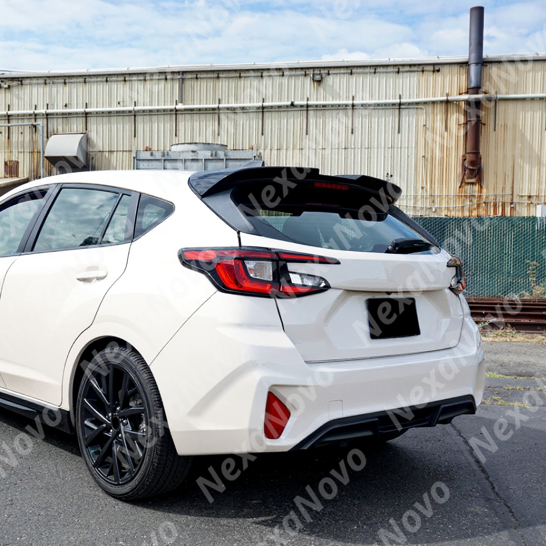Subaru Impreza RS on street with rear spoiler wing