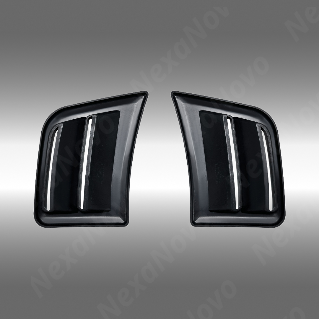 Close-up of the mirror-finish gloss black coating on the STI front bumper air ducts