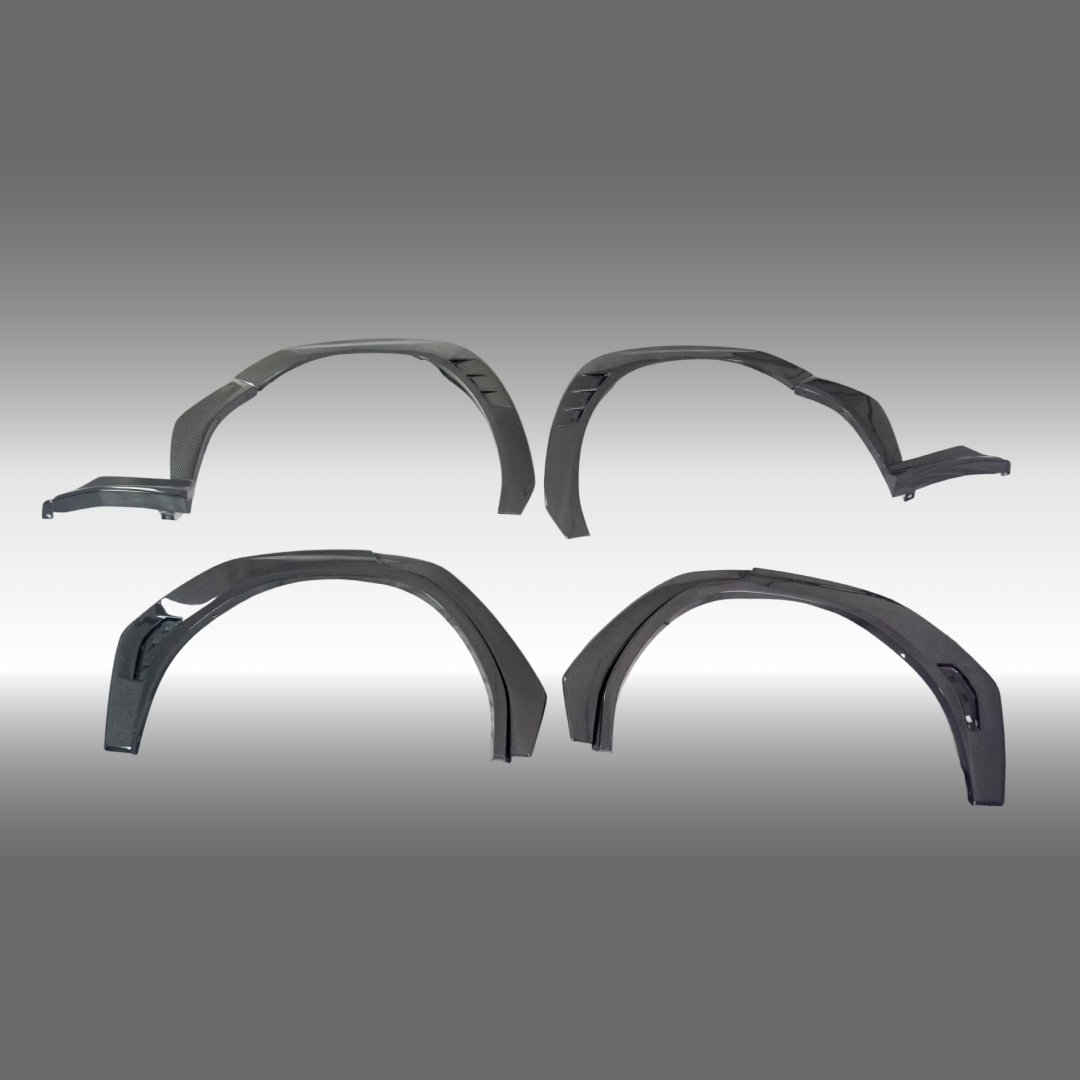 NexaNovo real carbon fiber BushWacker fender flare wheel trims on a 2021 Subaru WRX VB