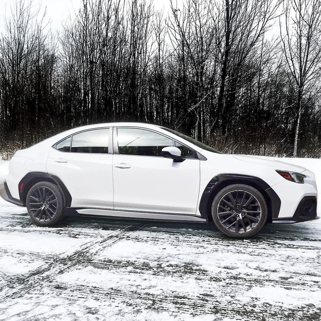 NexaNovo real carbon fiber wide body front fender flares on a 2021-2025 Subaru WRX
