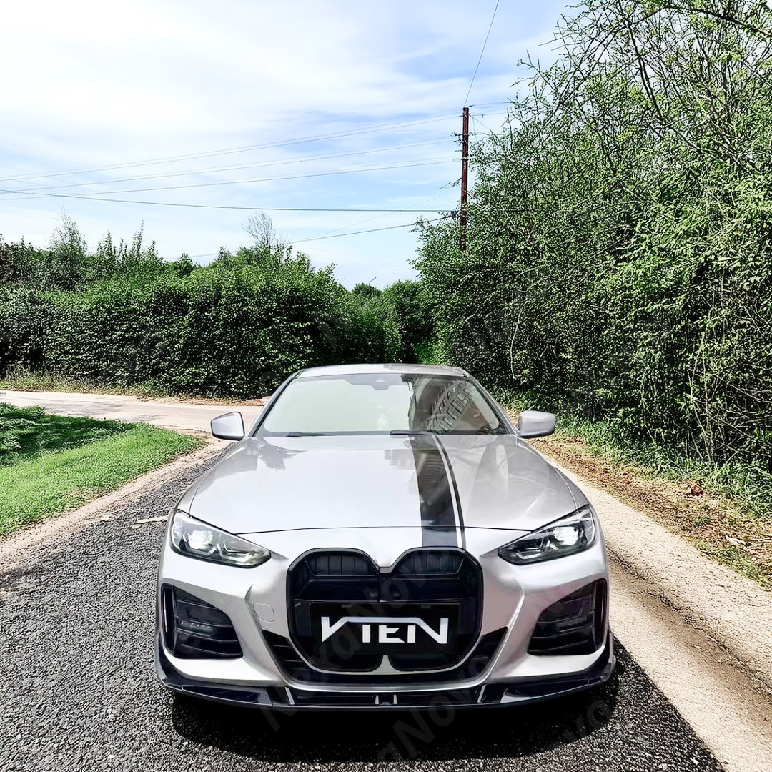 Dynamic shot of a BMW G22 G23 with its new NaxaNovo VTEN front lip.