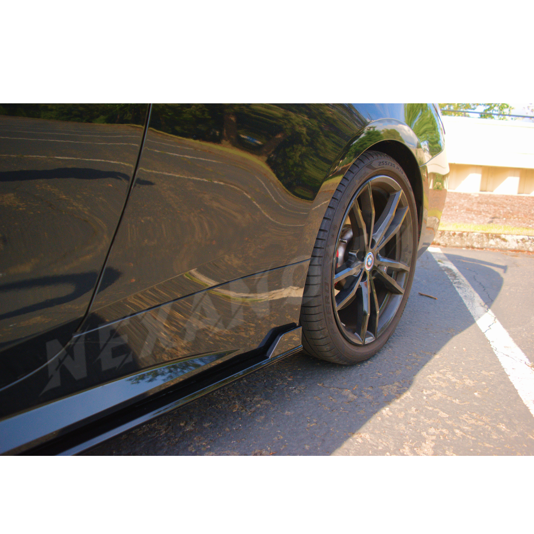 2021-2024 BMW 4 Series G26 equipped with NexaNovo Side Skirt Extensions Body Kit, providing a sporty and sleek gloss black aesthetic