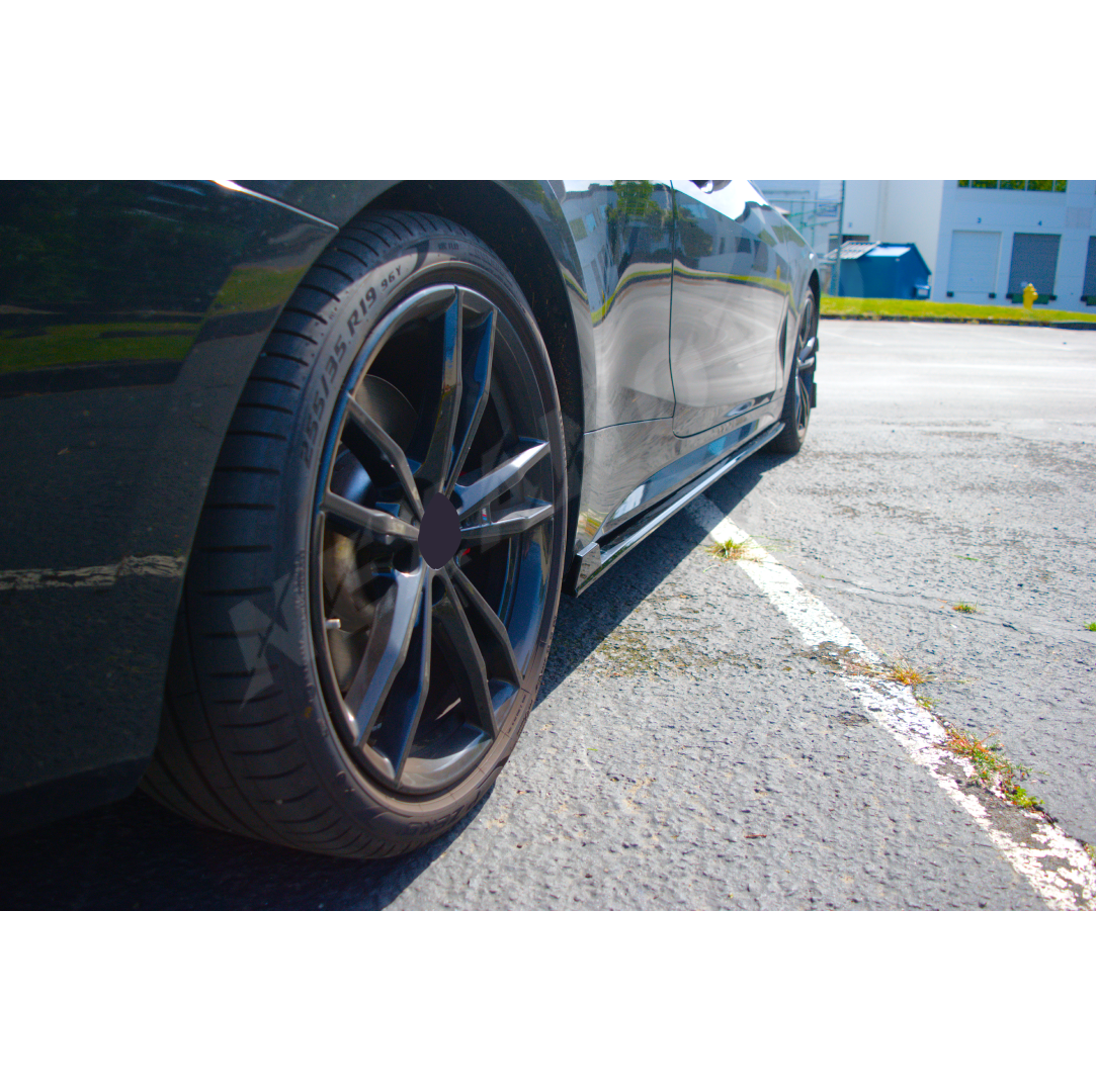 Car Skirt on BMW 4 Series G26 for the 2021-2024 model years, featuring a high-gloss black finish for a customized look, by NexaNovo.