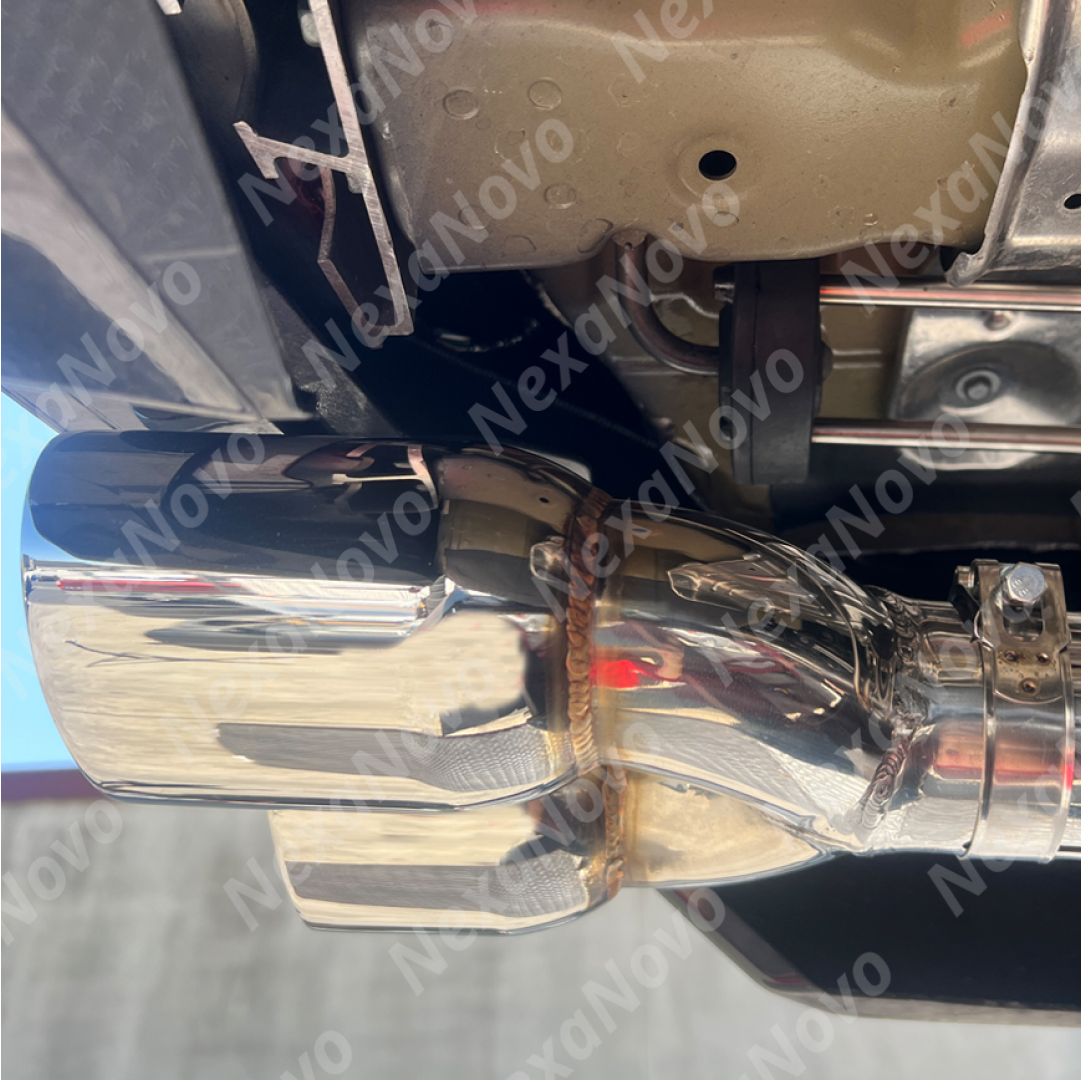 NexaNovo muffler delete quad tips integrated on a black Acura TLX