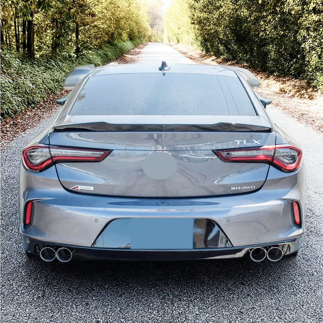Close-up of the NexaNovo quad exhaust tips on the Acura TLX muffler delete
