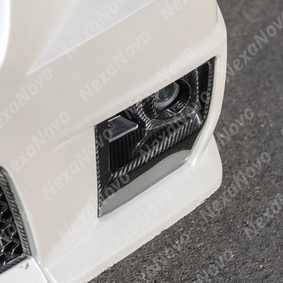 NexaNovo carbon fiber vent trim integrated on a black Cadillac CTS-V