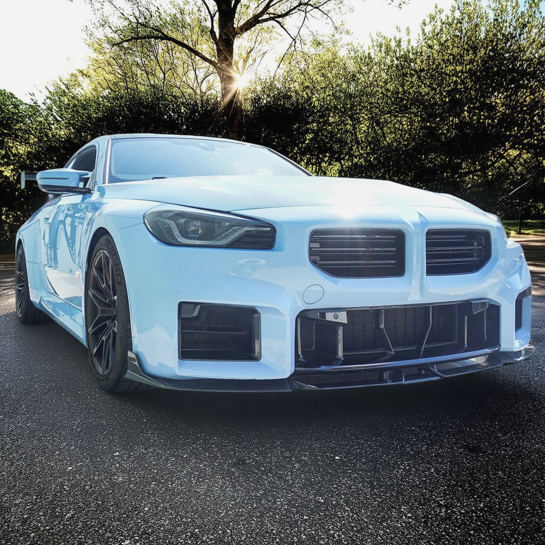 Sleek NexaNovo carbon fiber front splitter installed on BMW G87 M2