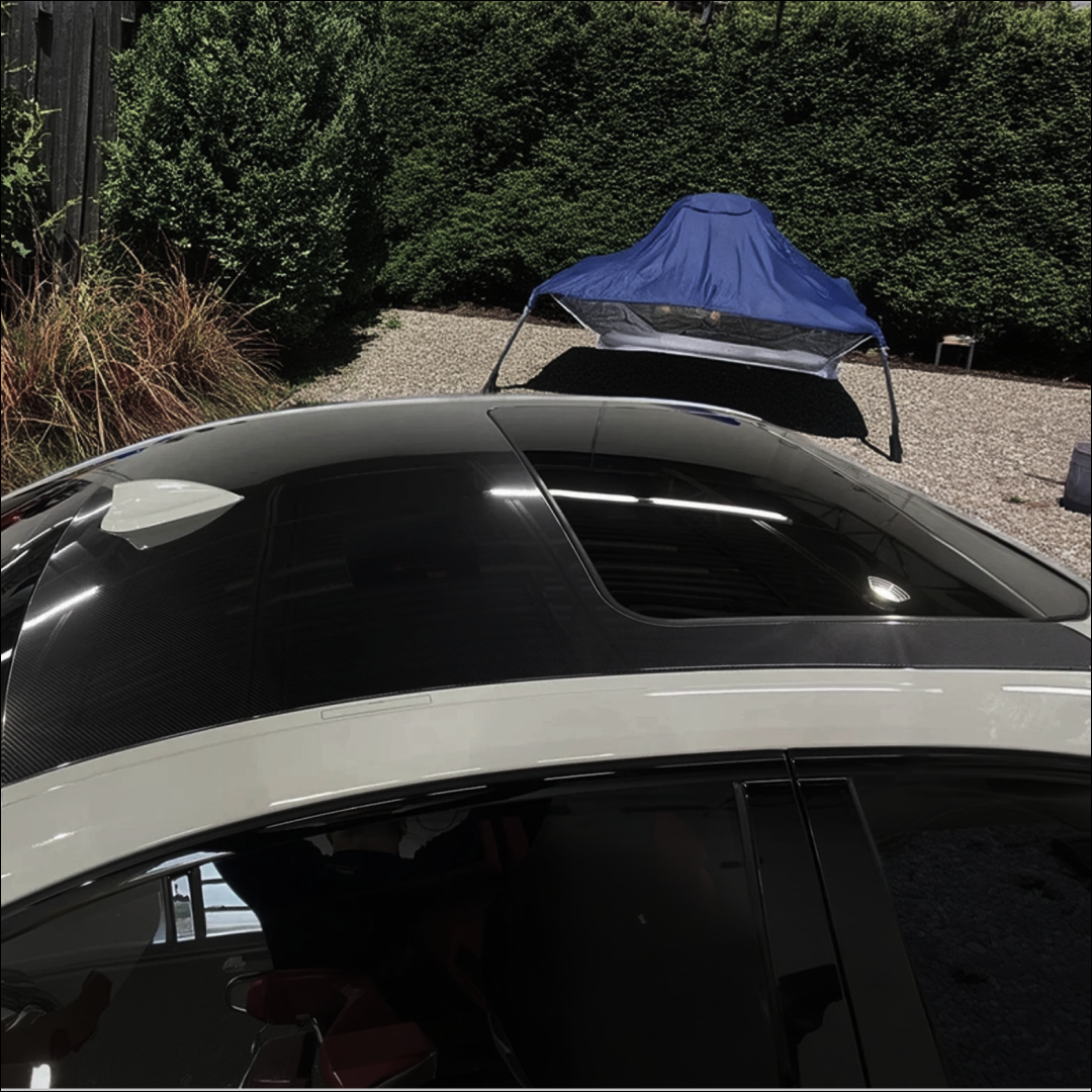 Full top view of a 2020 BMW G20 3 Series with new NexaNovo carbon fiber roof cover