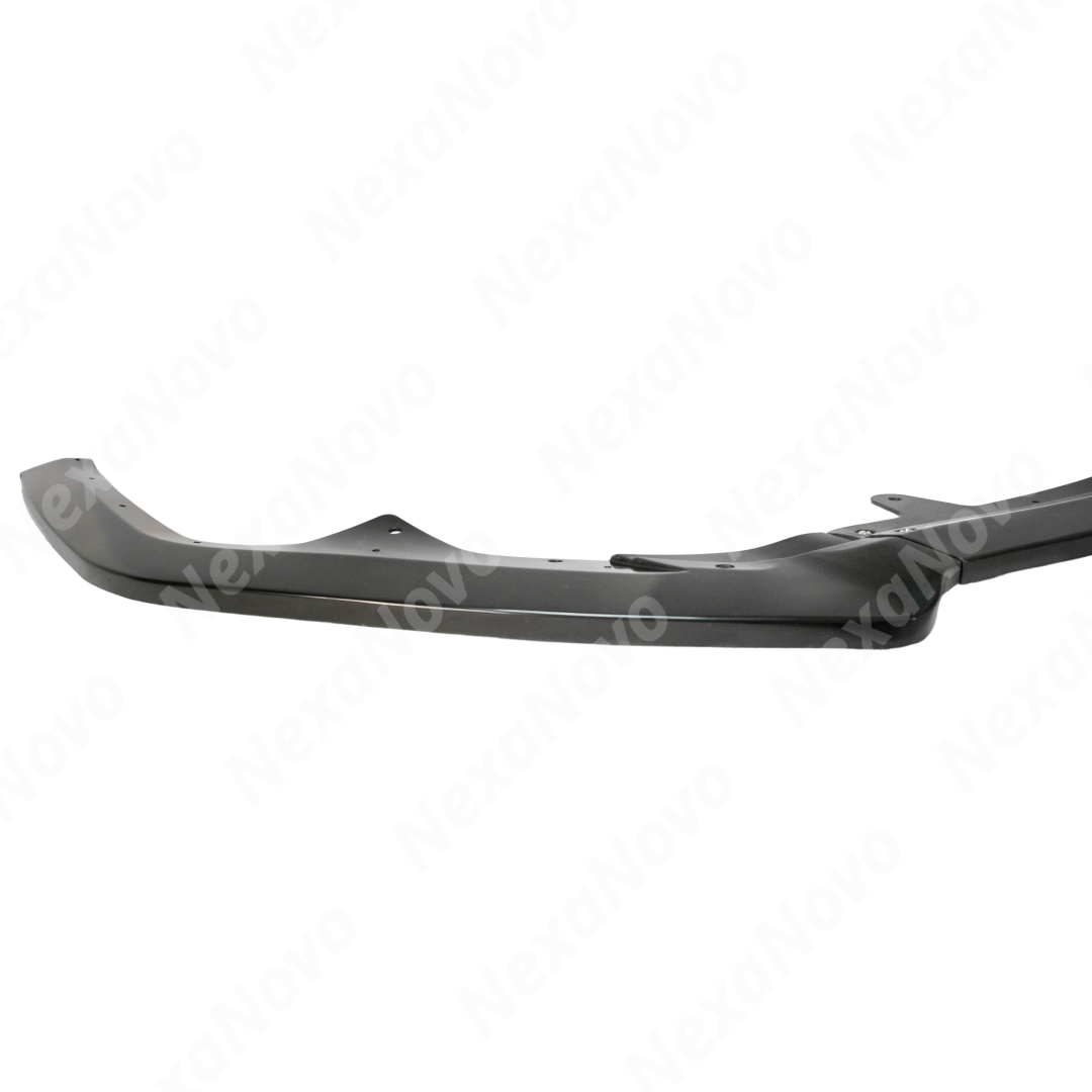 Low angle view emphasizing NexaNovo front splitter lip on Camry