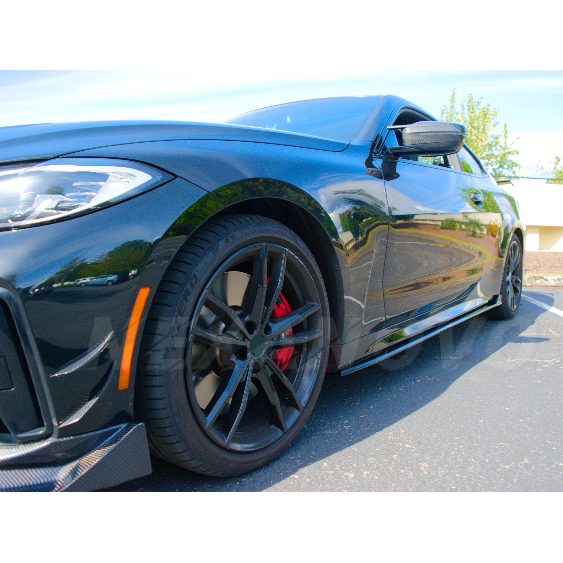 Gloss Black Side Skirt Splitter Set on a 2021 BMW 4 Series G22, designed to add a sharp and aggressive touch, by NexaNovo.