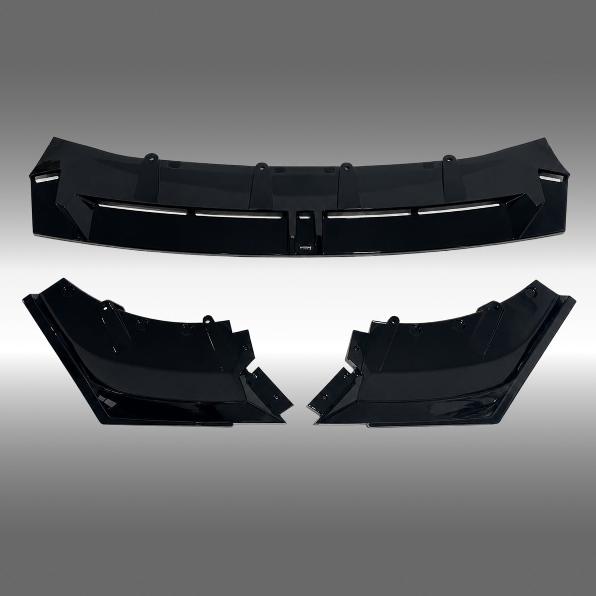 NexaNovo VTEN style gloss black front lip splitter installed on a 2024 BMW 5 Series G60 sedan