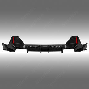 NexaNovo VTEN style gloss black rear diffuser installed on a 2024 BMW 5 Series G60 sedan